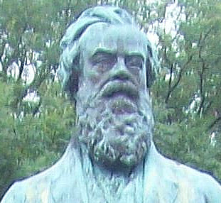[Detail of bronze statue of John Candlish MP, a middle-aged man with a large beard]